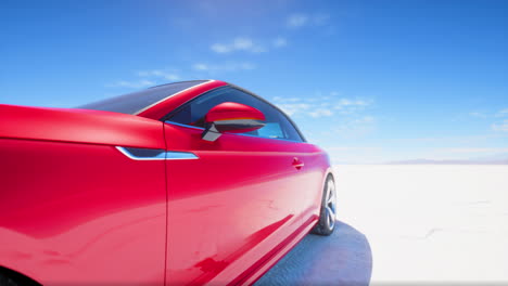 red convertible car on salt flats