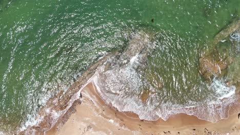 aerial view of the windy and rocky beach in ho tram in the afternoon