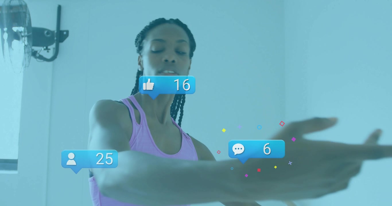 Dancer placing left hand on barre and initiating plié while displaying real-time social media icons