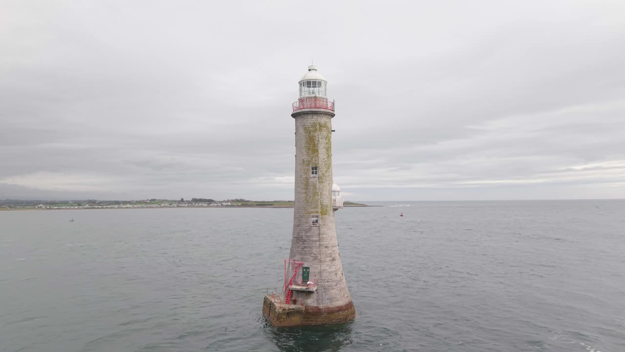 An Active 19th Century Stone Lighthouse in Cranfield Point of Northern Ireland
