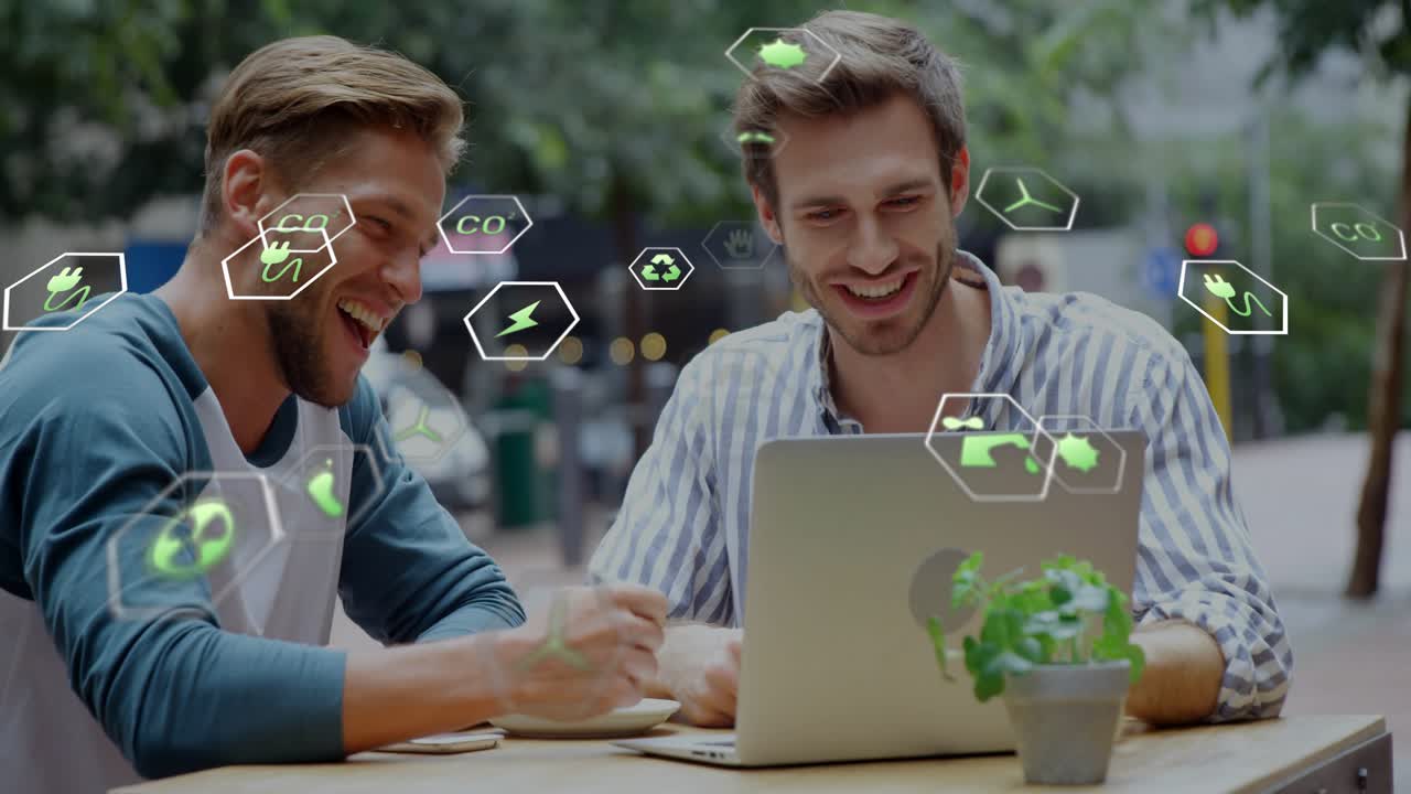 Two men clicking laptop at outdoor cafe starting green analysis session with animated eco icons