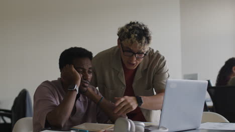 colleagues collaborating and supporting each other at work