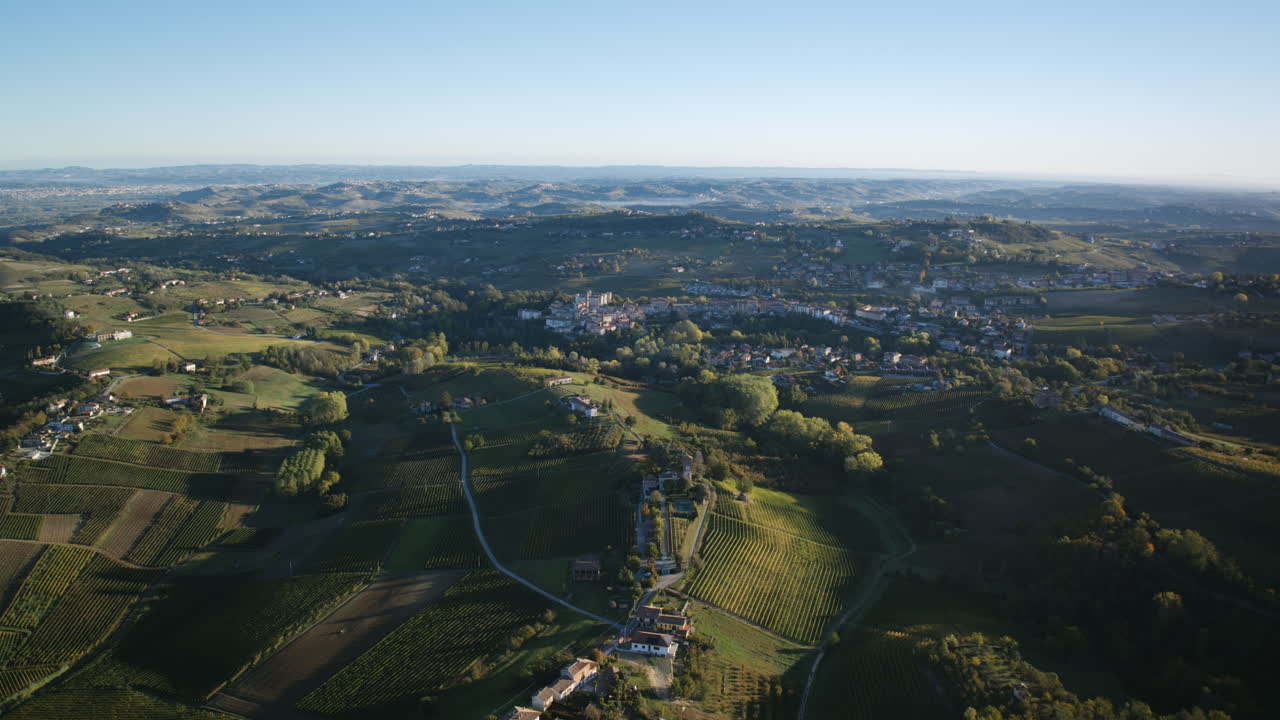 Static aerial timelapse of the early morning in northern Italy with Costigliole d'Asti in the background