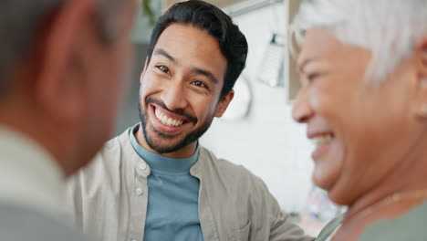 Happy,-man-and-senior-parents-talking-in-home