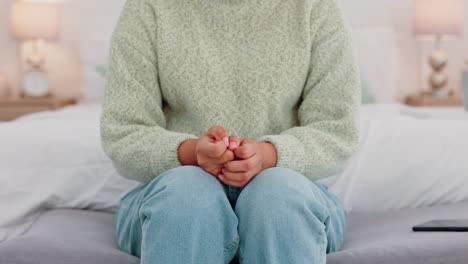 Stress,-anxiety-and-hands-of-woman-on-a-bed