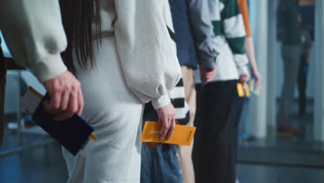 People waiting in line at an airport