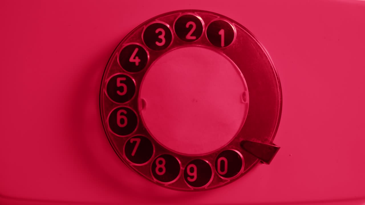 Retro vintage phone, A yellow rotary telephone is displayed on a wooden desk, adding a nostalgic touch