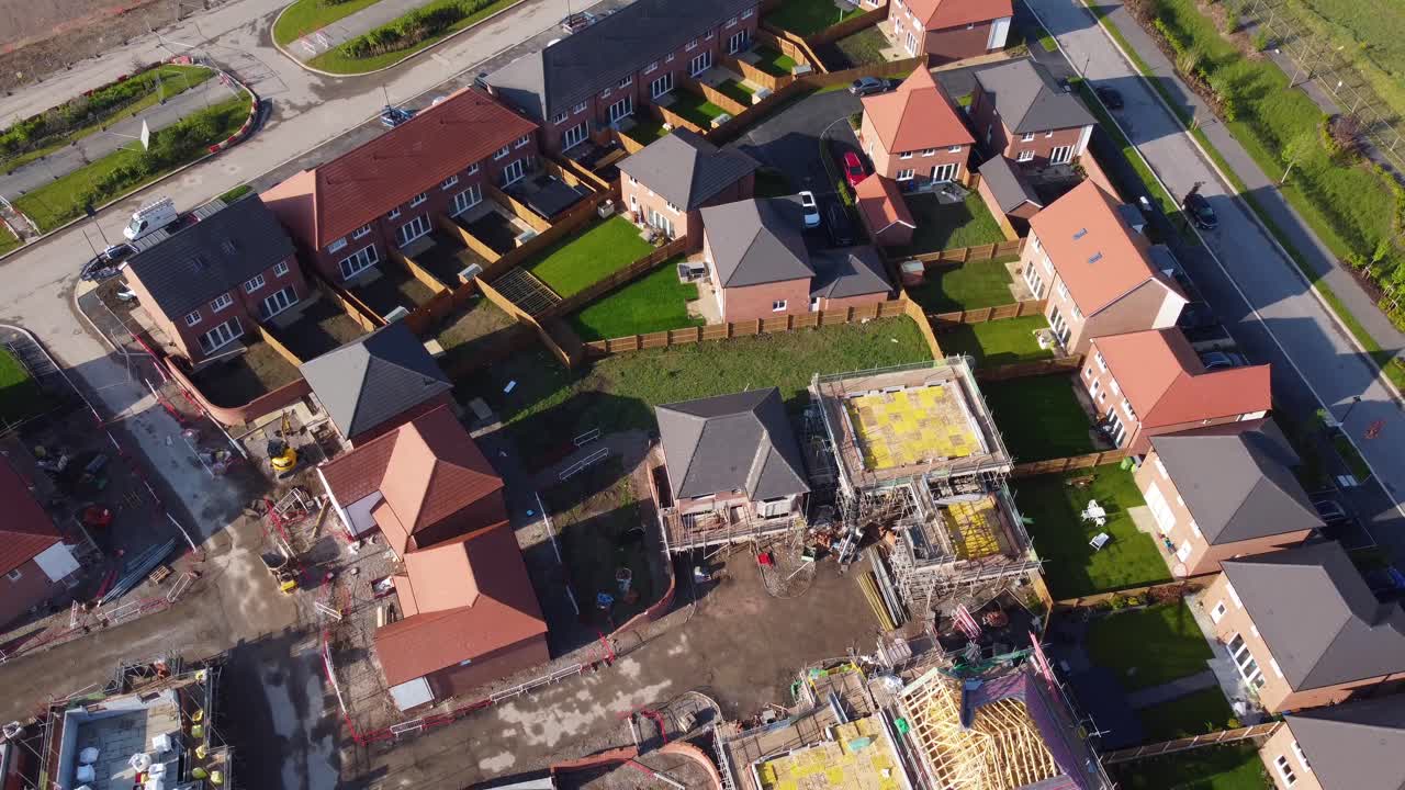 Drone aerial view of house building site in Cheshire, England, UK, Europe, illustrating urban development due to housing shortage in the UK.