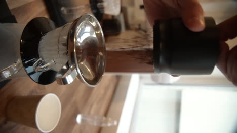 barista pouring coffee using a manual pour over method