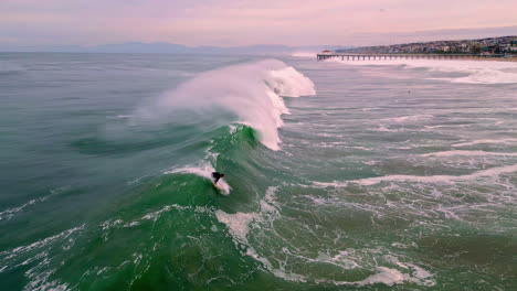 Man catching a wave and immediately bailing from the turbulence