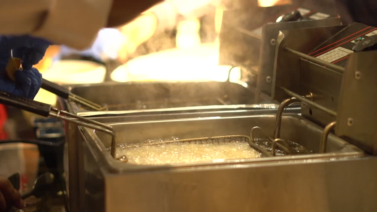 frying potato fries closeup view