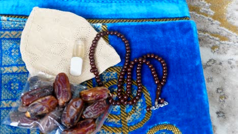 while muslims come from hajj, they bring dates, prayer rugs and rosaries as a gift.