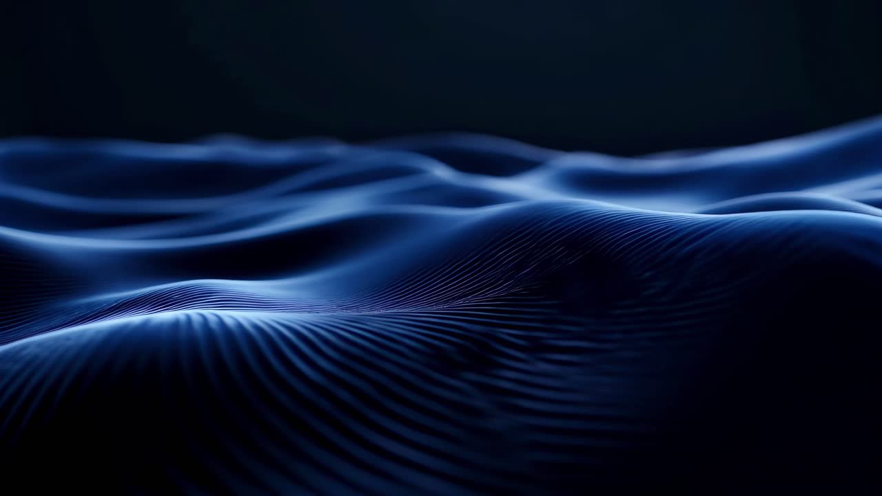 Abstract video of smooth, wavy blue textures from a low-angle view, creating a serene and futuristic