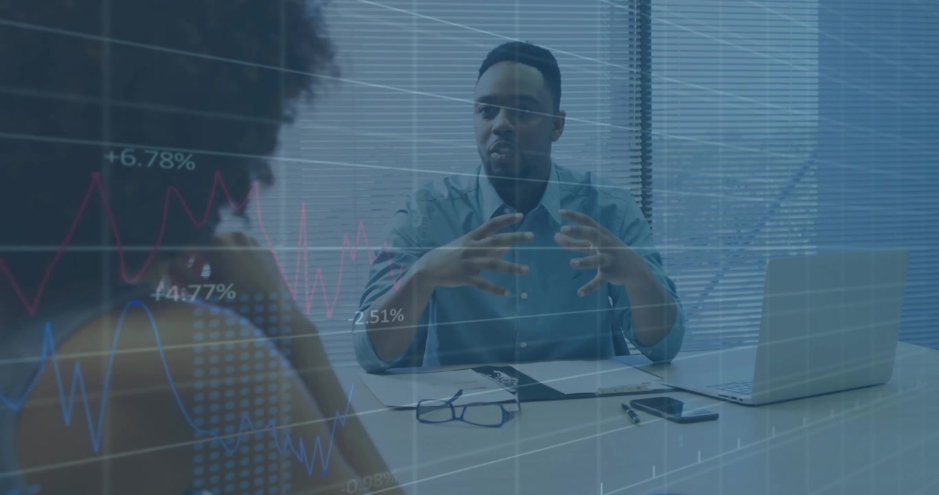 Business man explaining animating graphs rising +2