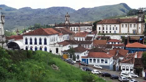 panning view of old buildings and baroque style architecture of ouro preto, former colonial mining town in minas gerais, brazil