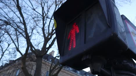 pedestrian traffic light turns green, close up shot