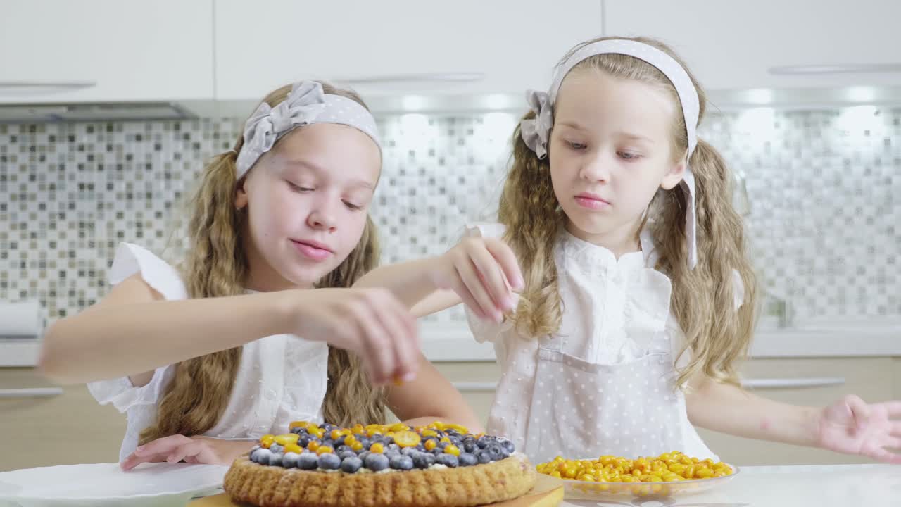 Sisters Decorating a Fruit Cake