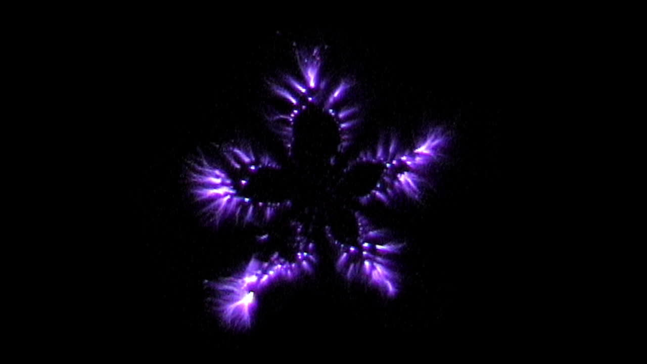 fotografía kirlian de la descarga electromagnética de una sección transversal de carambola