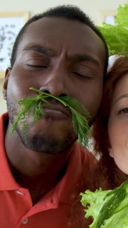 couple with greens on faces