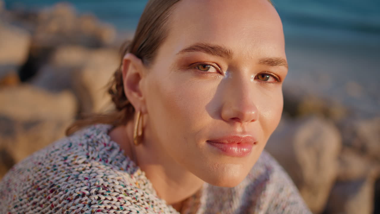 Charming girl resting shore in evening closeup. Smiling gorgeous lady posing