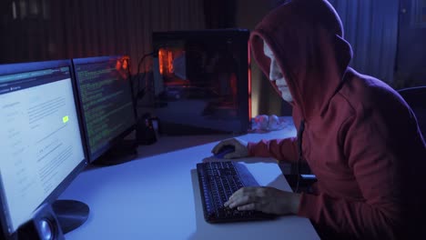 Hacker-Umgehen-Die-Cybersicherheit,-Indem-Sie-Spät-In-Der-Nacht-Code-Auf-Der-Tastatur-Eingeben.