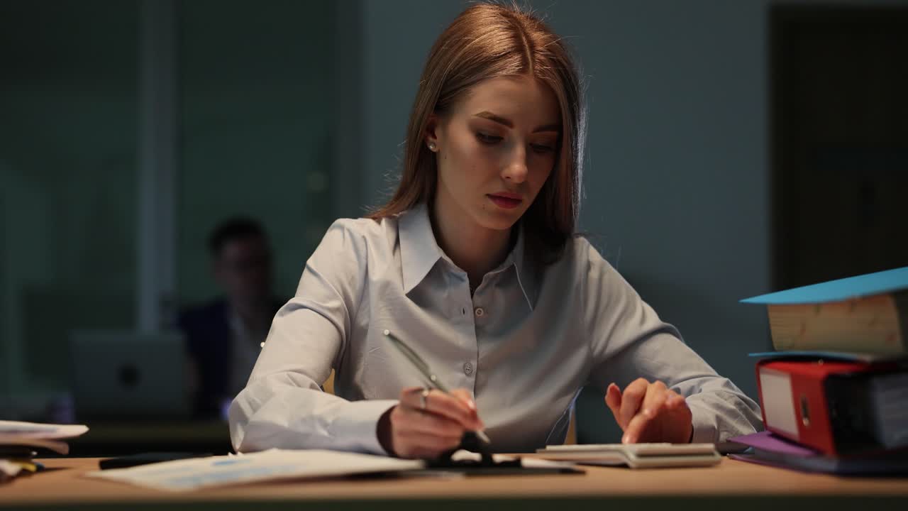 Woman working at her desk