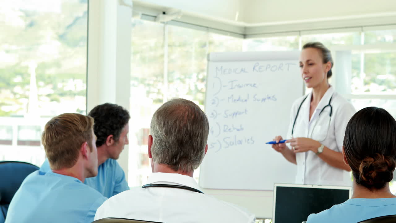 Medical team having medical report 