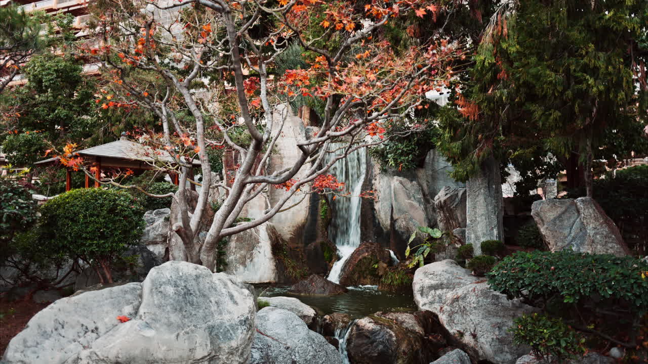 View of the a small waterfall in the Japanese Gardens in Monaco