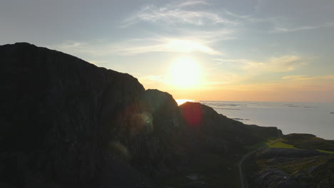 scenic sunset in the mountains, dønna island in nordland county, norway - aerial drone shot