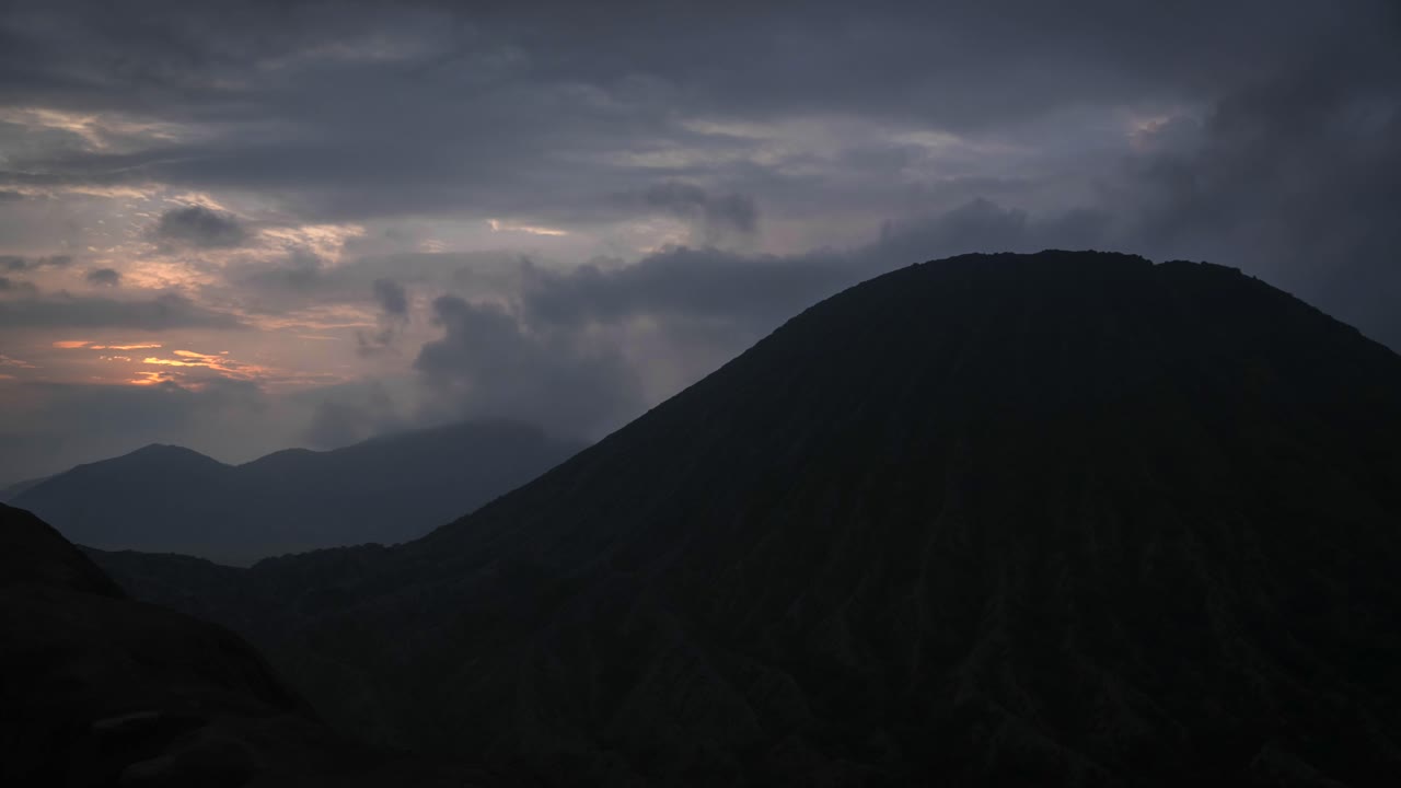 Bromo volcano timelapse Java Indonesia cloudy skyline sunset volcanic landscape