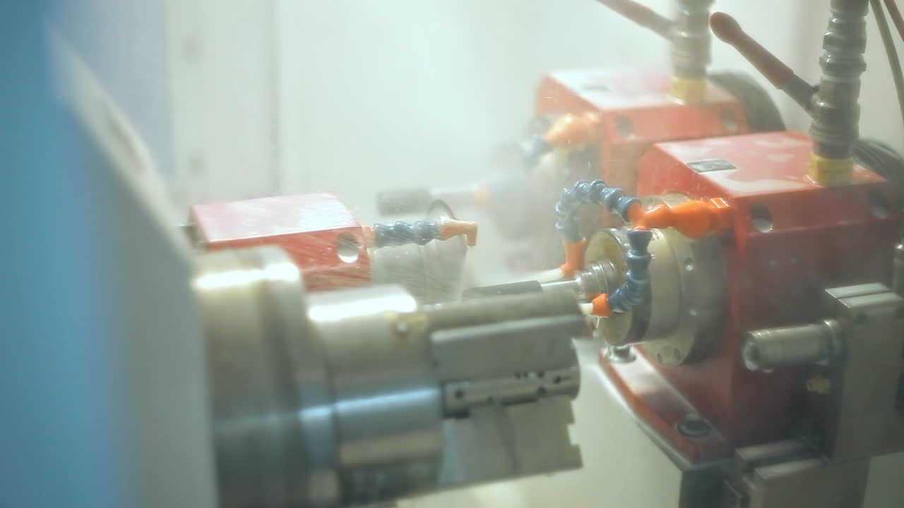 Jets of water cooling machine during metal working. Cooling of heating parts