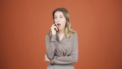 Thoughtful-young-woman-towards-camera-comes-up-with-an-idea.