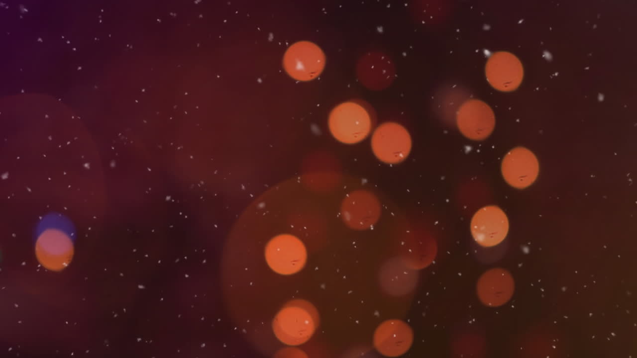 animación digital de la nieve cayendo sobre manchas de luz naranja contra un fondo negro