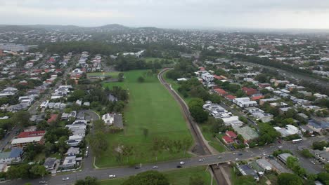 thompson estate reserve with view of pacific motorway in greenslopes suburb, qld, australia