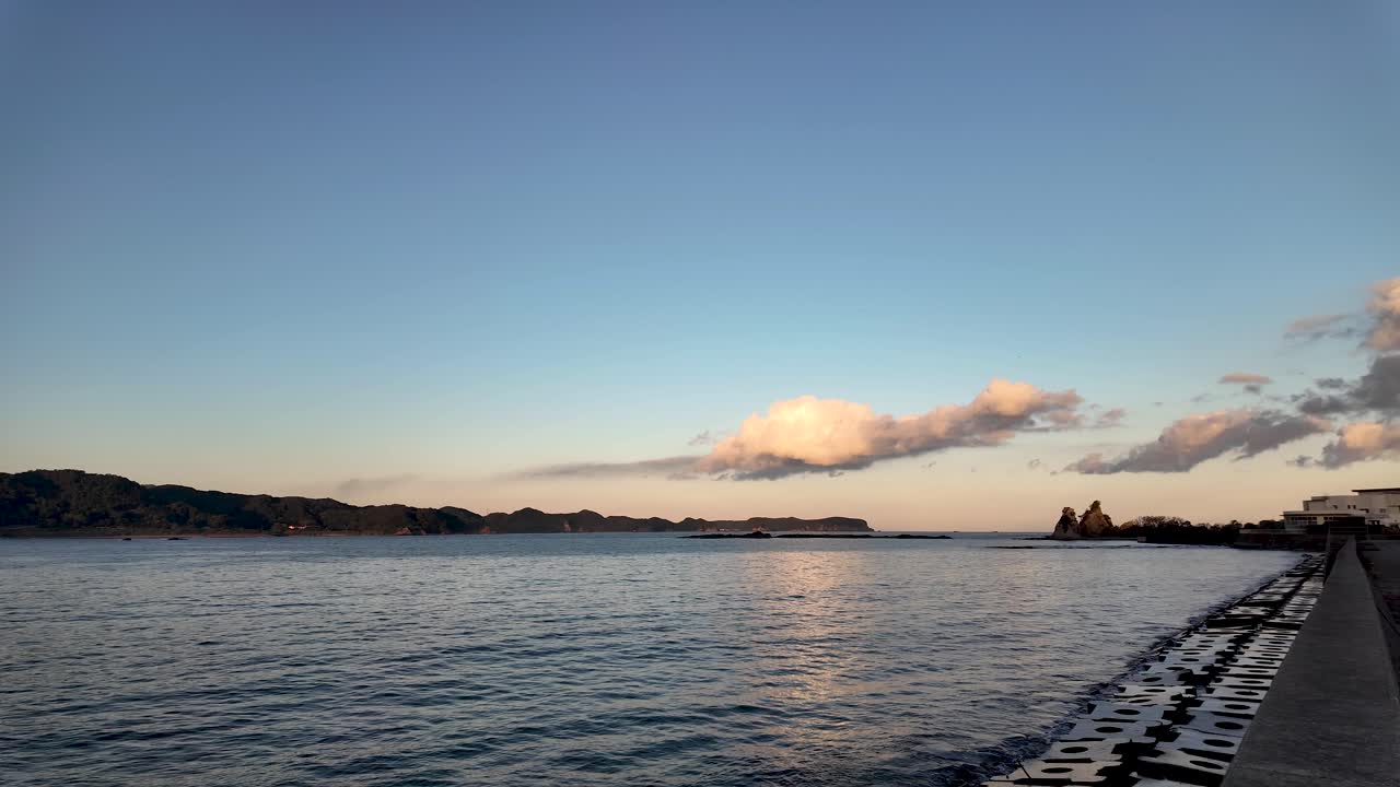 Beautiful sunset over Nachi Bay in Wakayama, Japan, during the golden hour.