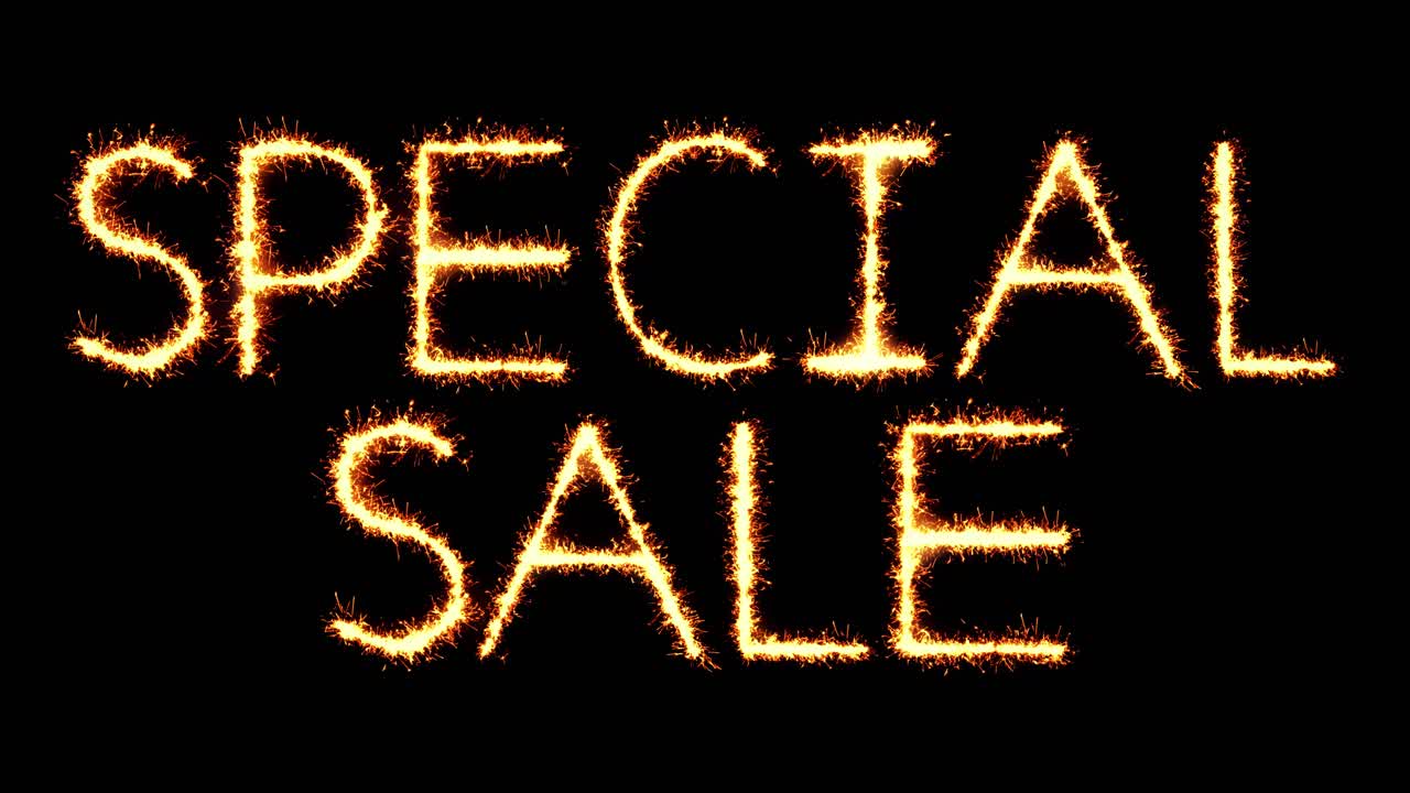 Special sale text sparkler writing with glitter sparks particles firework on black 4k loop