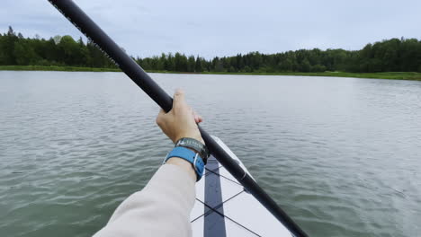 paddleboarding on a calm lake