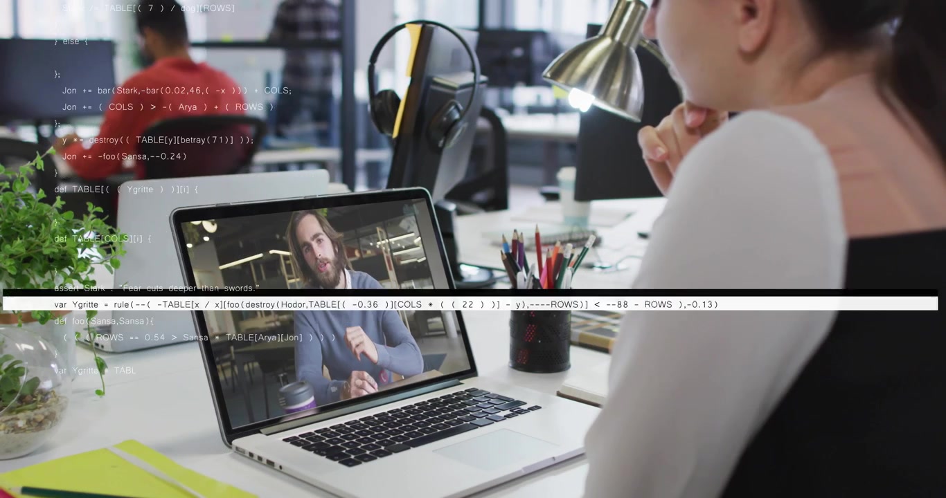 Businesswoman launching call for update while code glitches overlaying colleague referencing paper
