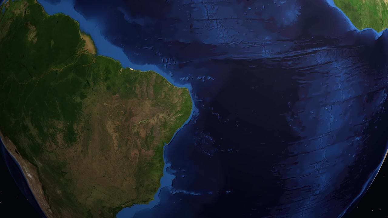 Un globo digitale ruota e ingrandisce il Sud America, individuando Olinda, Brasile, con coordinate geografiche.