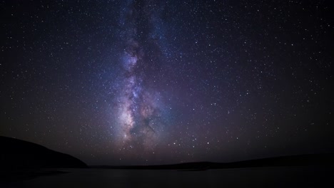 timelapse of the milky way over a lake