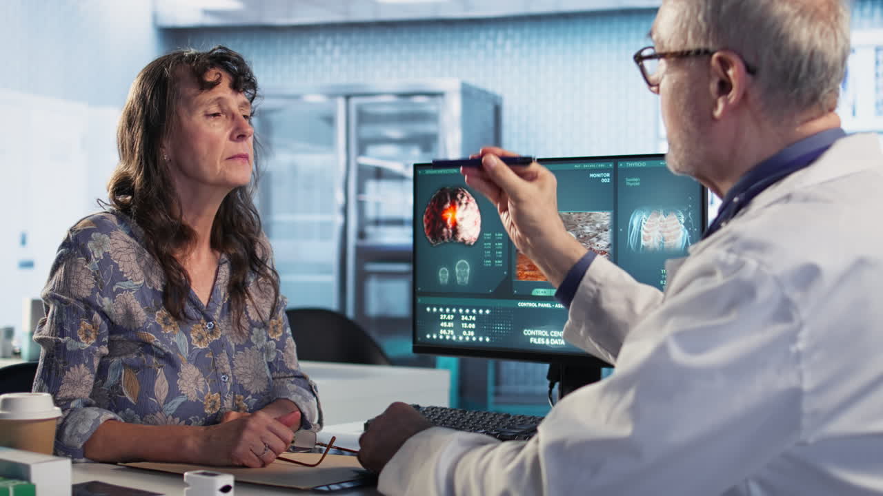 Vertical Video Male old healthcare provider conducts a concussion test in a medical clinic