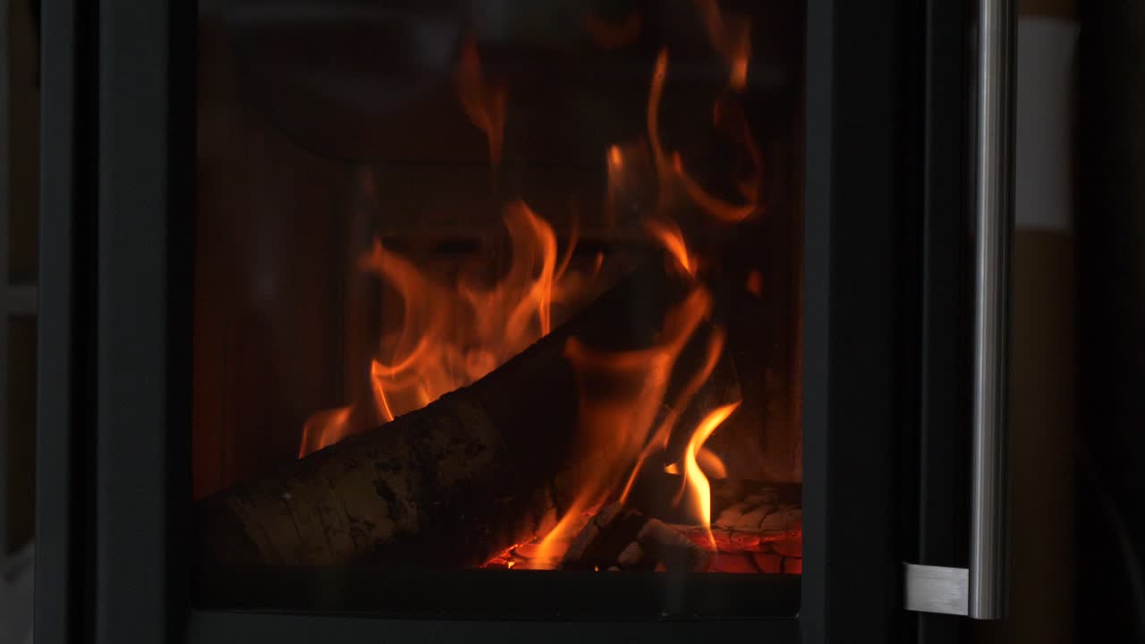 Slow motion of warming fire in winter
