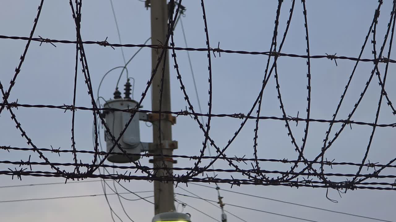 Barbed wire and razor wire security fencing is used at army areas and prisons to prevent unauthorized entry or escape, providing a strong physical and psychological barrier