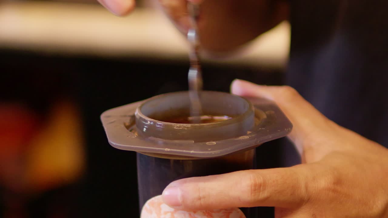 Learn the meticulous process of brewing a perfect coffee drink at home.