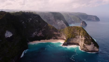 breathtaking aerial of kelingking beach and iconic cliffs, nusa penida