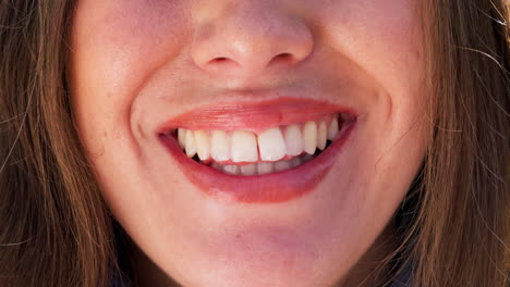 teeth, closeup and woman with a smile on face