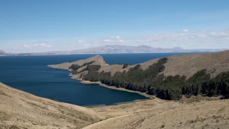 experience the incredible panoramic views from isla del sol in copacabana, bolivia. the vast expanse of lake titicaca, pristine landscapes, and the stunning natural beauty of this sacred island