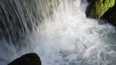 Waterfall-Flowing-Into-The-River-In-Summer-In-The-Forest