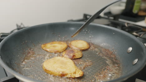 preparing caramelized pear in a frying pan. 4k