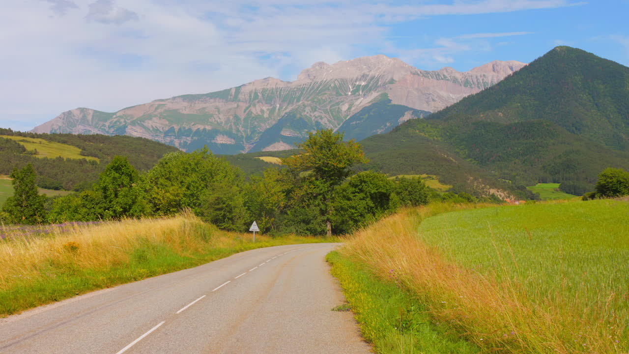 Amazing panoramic image of highway and mountains in Vercors Massif, France.